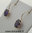 Kultaiset korvakorut, violetti 6x8 mm zirkoni